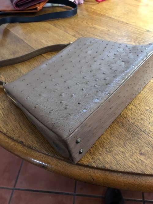 Genuine ostrich skin handbag in brown